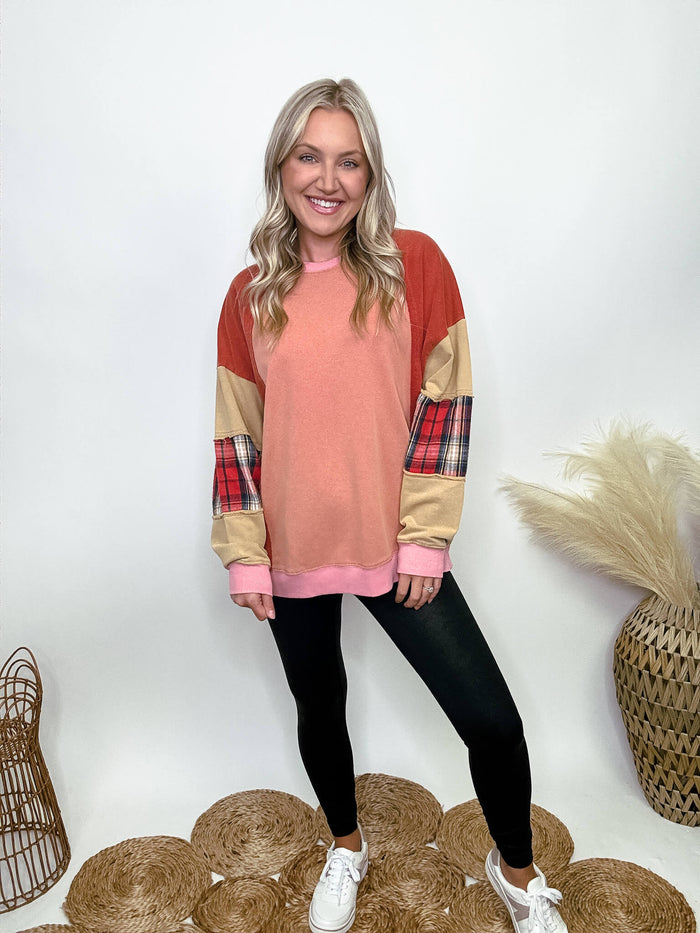 Easel Clothing Colorblock terry knit pullover with rounded neckline, dropped shoulders, plaid patches on sleeves, and exposed seams. Model Brooke is 5'4" wearing size small