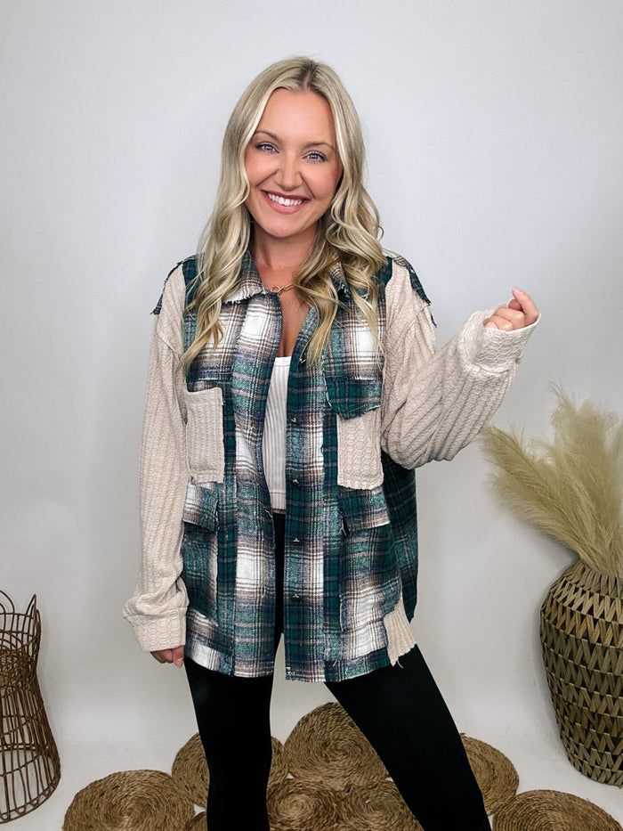 Long sleeve plaid shacket top with textured knit patch, metal button-down front, raw edge detailing, and two pockets on each side, by POL Clothing.