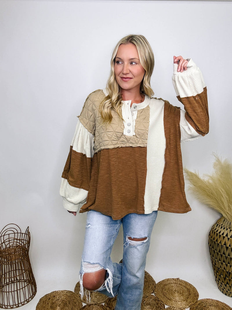 POL Clothing Oat Chocolate Cognac tan and ivory thermal top with quilted contrast patchwork, round neck, balloon sleeves, and henley button-up design.