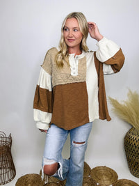 POL Clothing Oat Chocolate Cognac tan and ivory thermal top with quilted contrast patchwork, round neck, balloon sleeves, and henley button-up design.