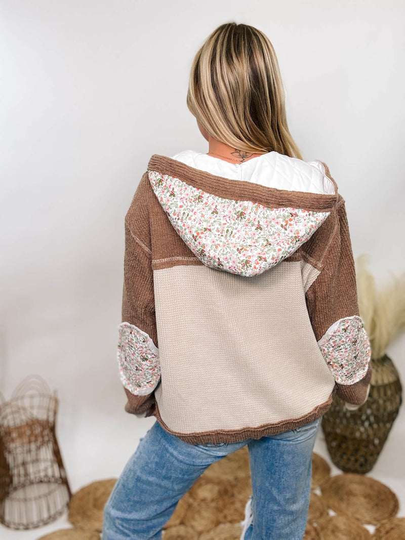 POL Boho floral oat and chocolate oversized quilted patchwork hoodie jacket with floral print elbow patches and a drawstring waist, featuring a button-up front and quilted hood.