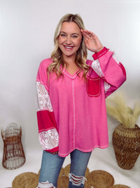 POL Hot Pink and Lace Patch Long Sleeve Boho Top in Hot Pink by POL Clothing with floral lace details, v-neckline, balloon sleeves, and side slits for a chic, stylish look.