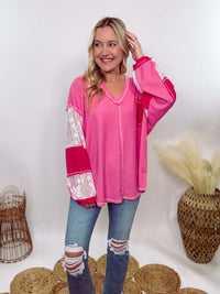 POL Hot Pink and Lace Patch Long Sleeve Boho Top in Hot Pink by POL Clothing with floral lace details, v-neckline, balloon sleeves, and side slits for a chic, stylish look.