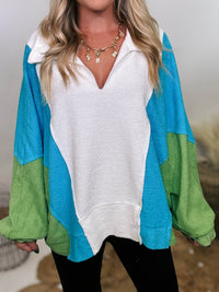 Bucketlist Blue, green, and white reverse French terry oversized pullover with v-neckline, collar, and long sleeves