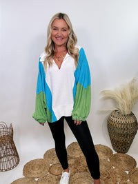 Bucketlist Blue, green, and white reverse French terry oversized pullover with v-neckline, collar, and long sleeves