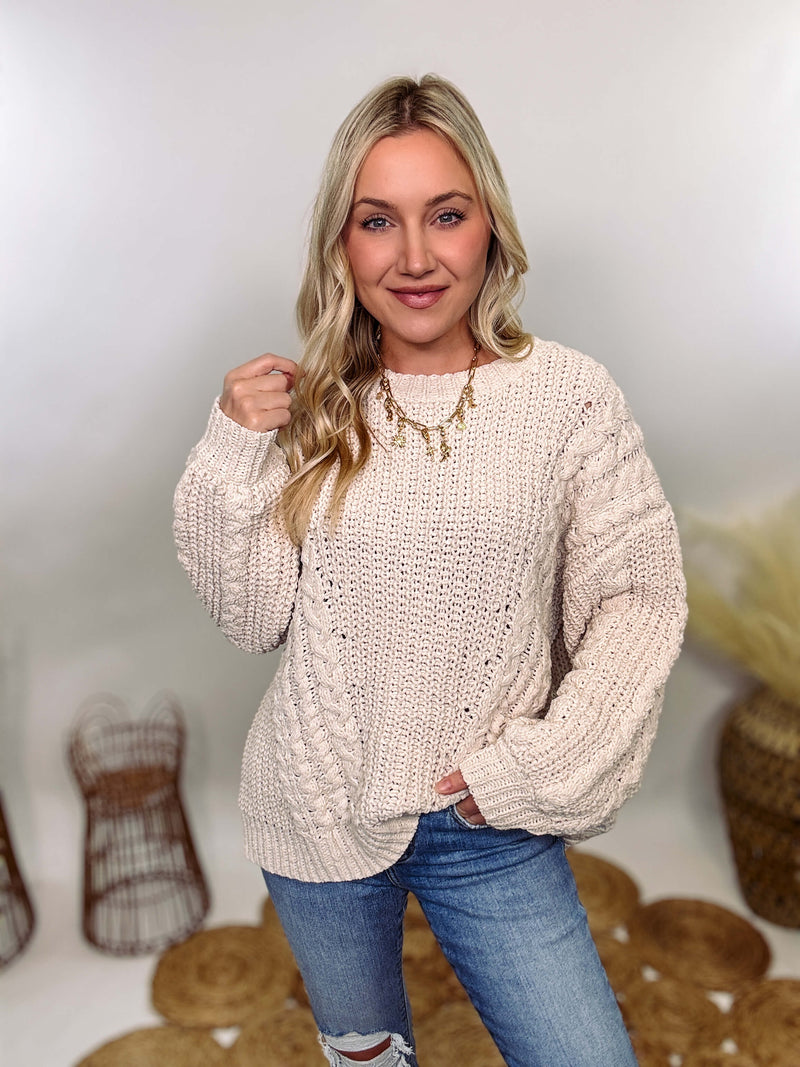 Cream oversized knit sweater by POL featuring a super soft chenille-like texture, premium quality, and 100% polyester material. Designed with an oversized fit for cozy comfort and versatile winter styling.