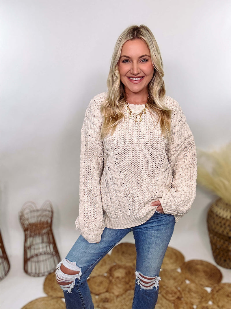 Cream oversized knit sweater by POL featuring a super soft chenille-like texture, premium quality, and 100% polyester material. Designed with an oversized fit for cozy comfort and versatile winter styling.