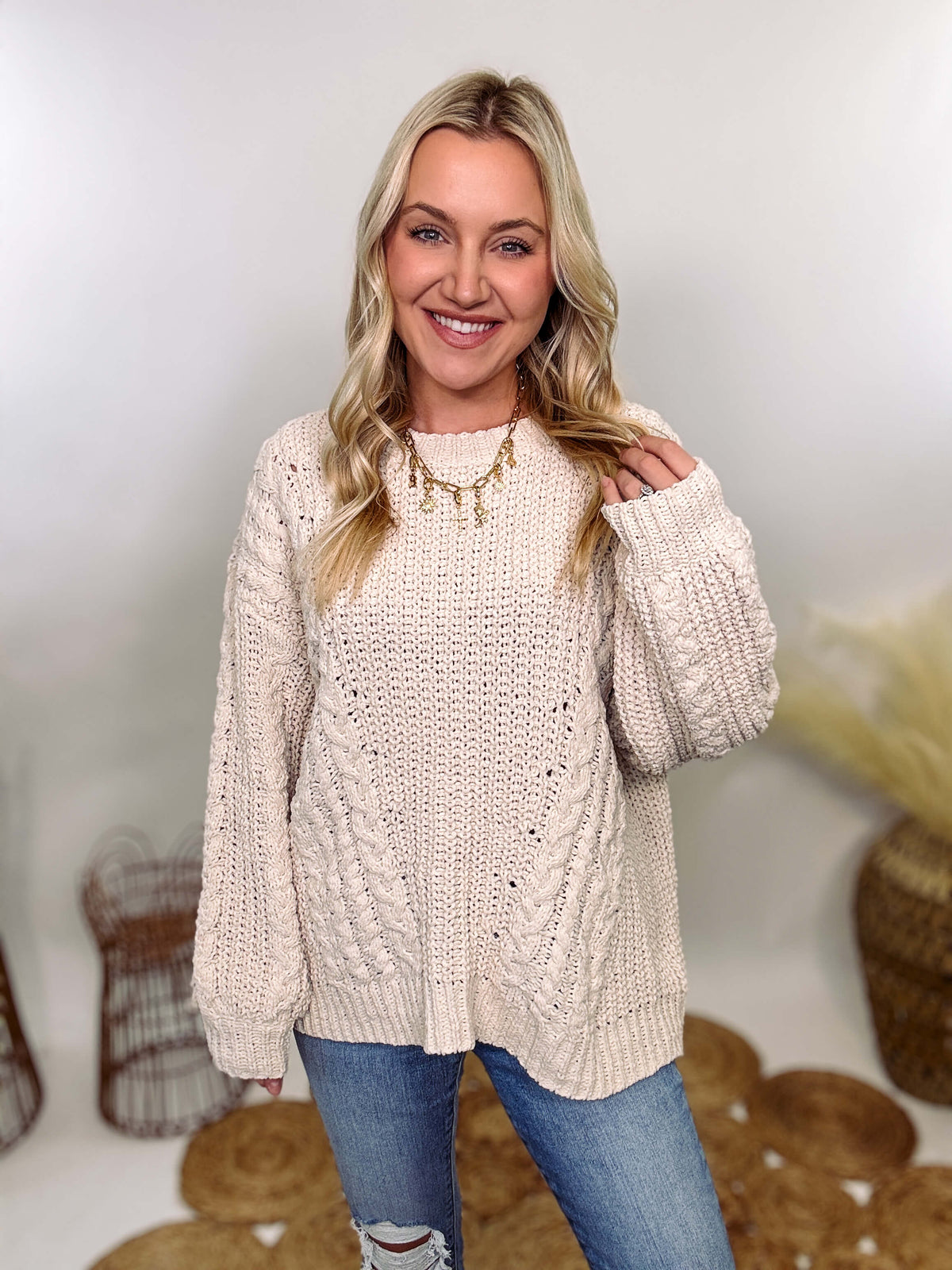 Cream oversized knit sweater by POL featuring a super soft chenille-like texture, premium quality, and 100% polyester material. Designed with an oversized fit for cozy comfort and versatile winter styling.