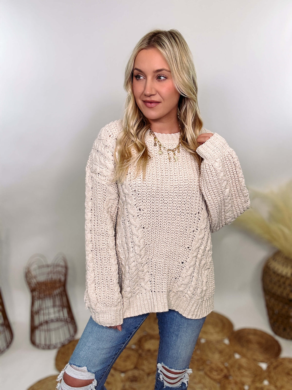 Cream oversized knit sweater by POL featuring a super soft chenille-like texture, premium quality, and 100% polyester material. Designed with an oversized fit for cozy comfort and versatile winter styling.