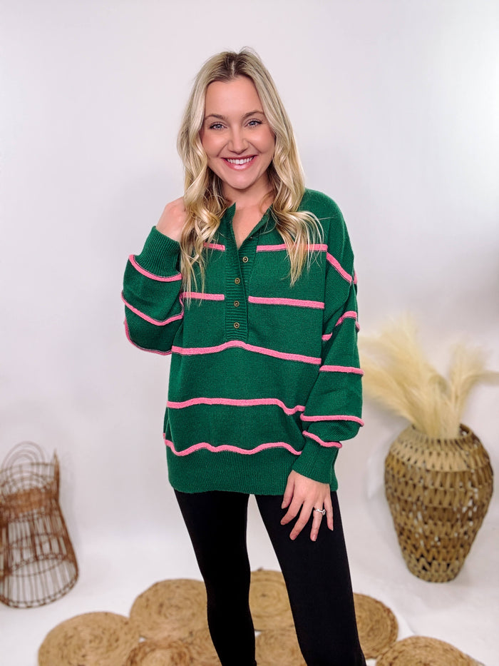 Hunter Green and Pink Stripe Henley Button-Down Oversized Sweater with a relaxed fit, ribbed hem, and soft, stretchy polyester fabric.