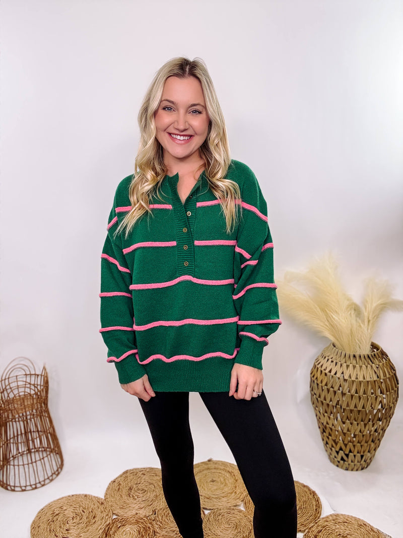 Hunter Green and Pink Stripe Henley Button-Down Oversized Sweater with a relaxed fit, ribbed hem, and soft, stretchy polyester fabric.