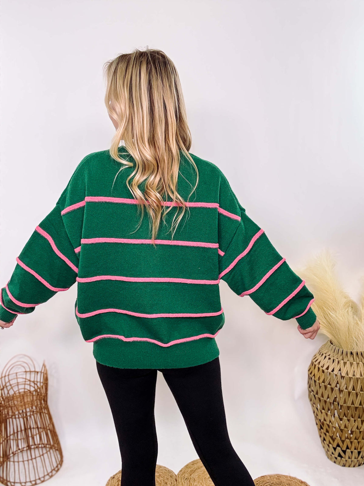 Hunter Green and Pink Stripe Henley Button-Down Oversized Sweater with a relaxed fit, ribbed hem, and soft, stretchy polyester fabric.