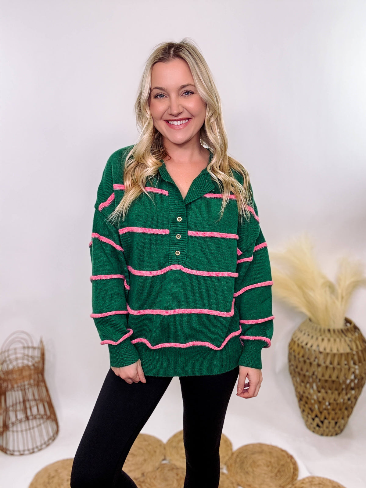 Hunter Green and Pink Stripe Henley Button-Down Oversized Sweater with a relaxed fit, ribbed hem, and soft, stretchy polyester fabric.