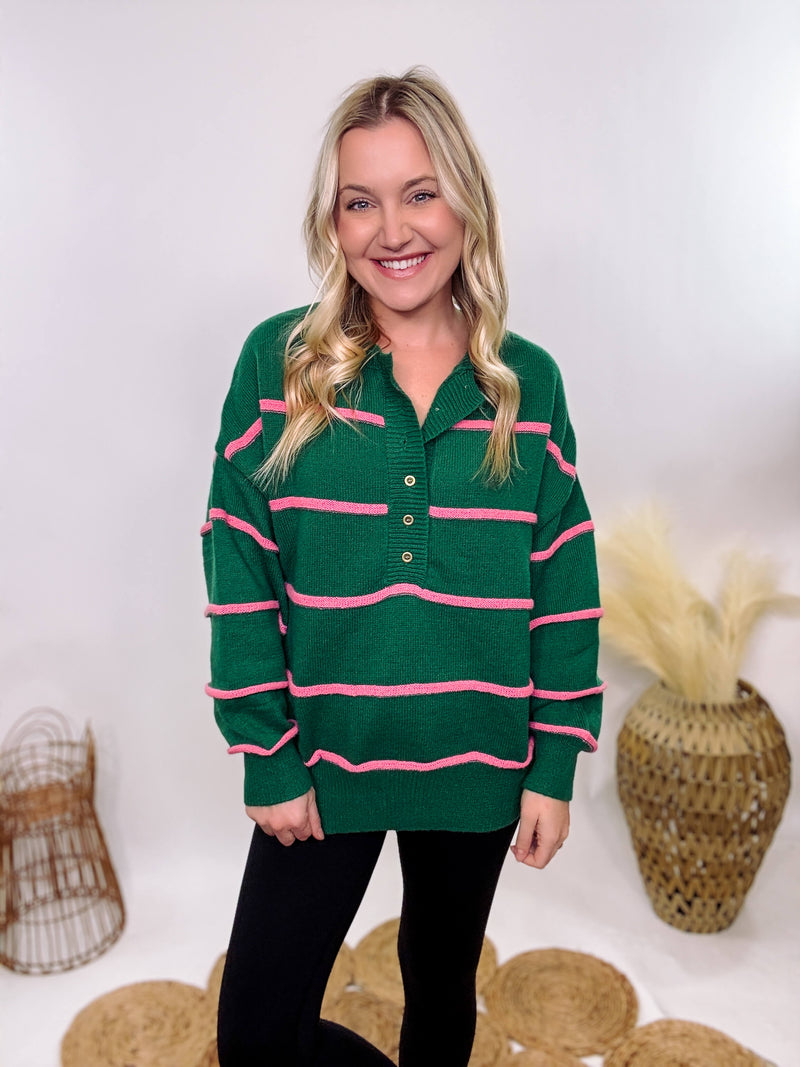 Hunter Green and Pink Stripe Henley Button-Down Oversized Sweater with a relaxed fit, ribbed hem, and soft, stretchy polyester fabric.