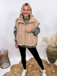 Hyfve tan camel sherpa vest with side ties, button-up front, and oversized cut creating a cap sleeve effect.