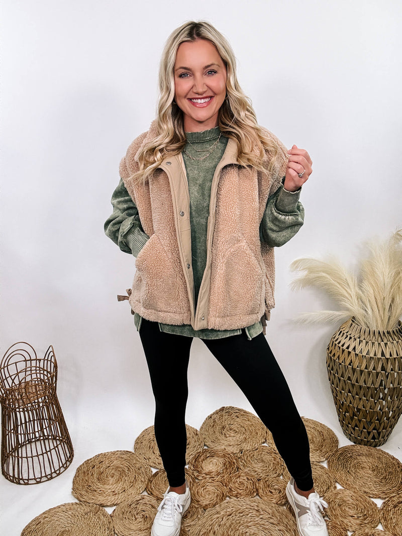 Hyfve tan camel sherpa vest with side ties, button-up front, and oversized cut creating a cap sleeve effect.