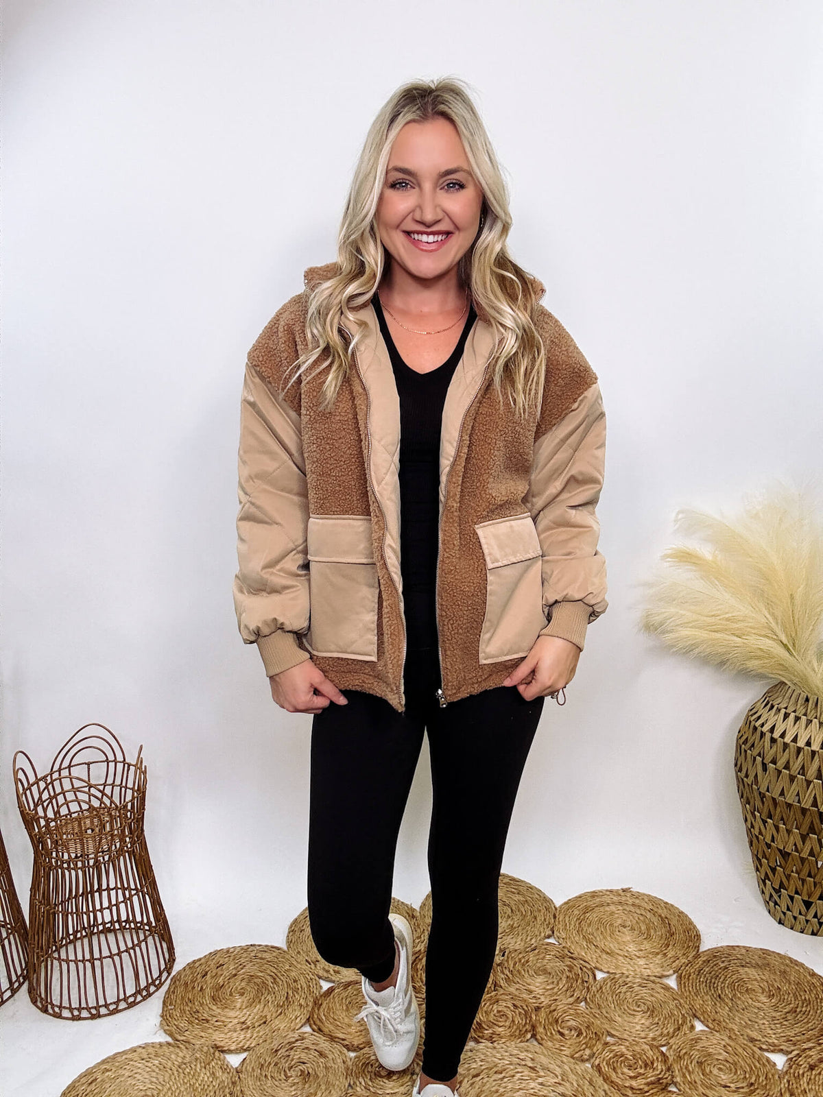 Hyfve - Embrace cozy style with our Reversible Sherpa Quilted Puffer Jacket in taupe camel. This warm, versatile jacket features a sherpa and quilted design, drop shoulders, and an adjustable waist toggle.