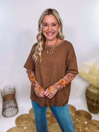 In Loom Mushroom Brown Oversized Tee with Layered Sheer Embroidered Floral Lace Mesh Sleeves – Relaxed Fit, Feminine Detailing, and Edgy Winter Style.