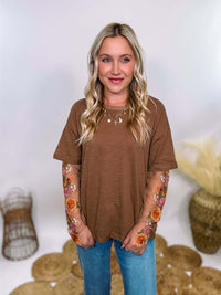 In Loom Mushroom Brown Oversized Tee with Layered Sheer Embroidered Floral Lace Mesh Sleeves – Relaxed Fit, Feminine Detailing, and Edgy Winter Style.