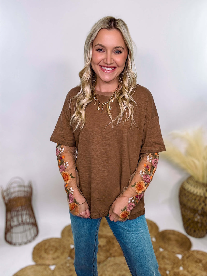 In Loom Mushroom Brown Oversized Tee with Layered Sheer Embroidered Floral Lace Mesh Sleeves – Relaxed Fit, Feminine Detailing, and Edgy Winter Style.