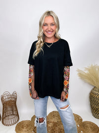 In Loom Oversized black tee with layered sheer embroidered floral lace mesh sleeves, perfect for fall with edgy vibes.