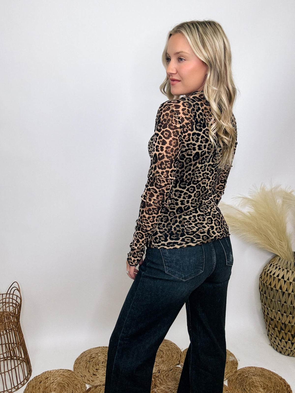 Very J Leopard animal print sheer mesh long sleeve top with high neck and fitted silhouette.