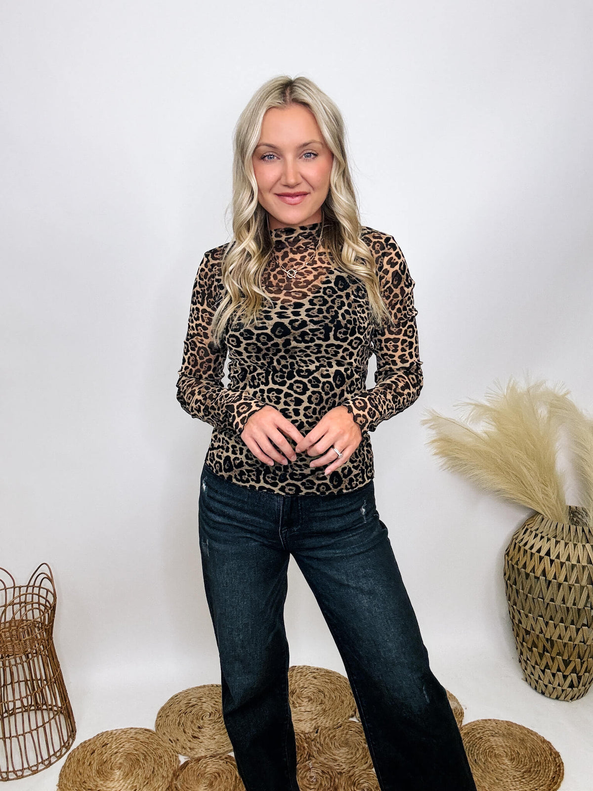 Very J Leopard animal print sheer mesh long sleeve top with high neck and fitted silhouette.