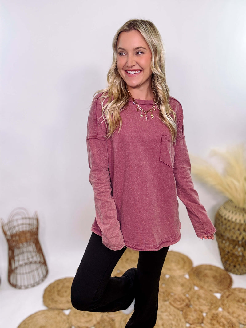 Mauve Acid Washed Long Sleeve Top with Raw Edge Detail, Chest Pocket, and Relaxed Fit – Perfect for Casual Outfits with Leggings and Sneakers.