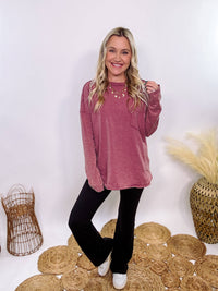 Mauve Acid Washed Long Sleeve Top with Raw Edge Detail, Chest Pocket, and Relaxed Fit – Perfect for Casual Outfits with Leggings and Sneakers.