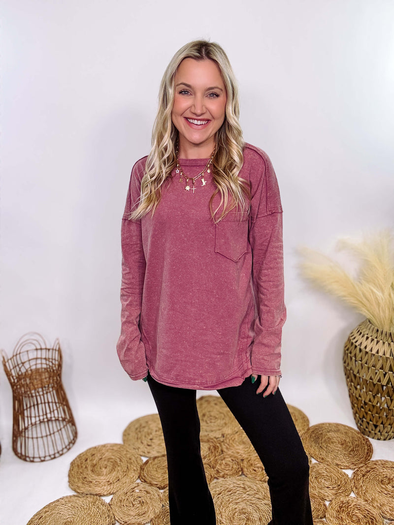 Mauve Acid Washed Long Sleeve Top with Raw Edge Detail, Chest Pocket, and Relaxed Fit – Perfect for Casual Outfits with Leggings and Sneakers.