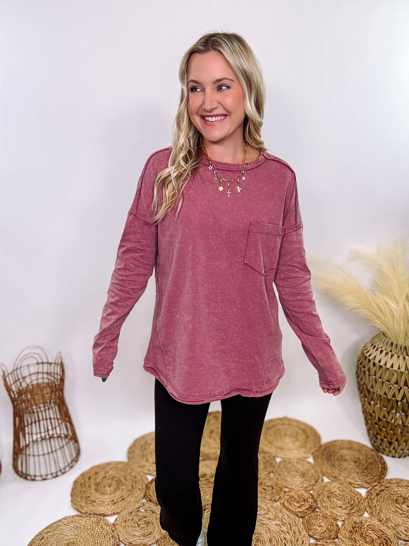 Mauve Acid Washed Long Sleeve Top with Raw Edge Detail, Chest Pocket, and Relaxed Fit – Perfect for Casual Outfits with Leggings and Sneakers.