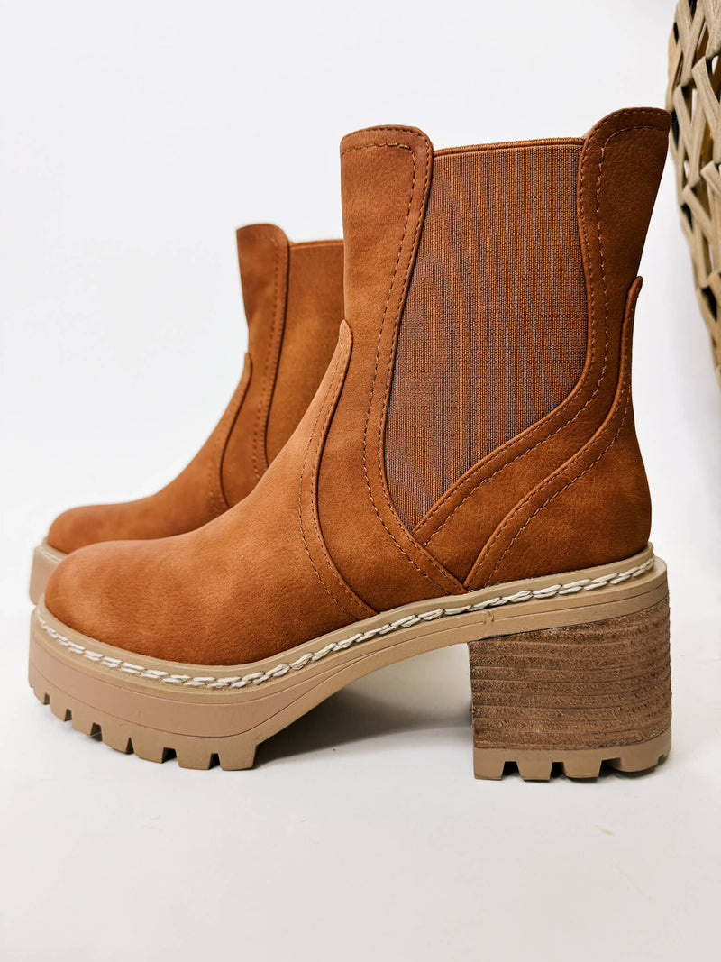 MIA Torren Boot in cognac, featuring a slip-on design with elastic stretchy tabs, platform sole, chunky stacked heel, and lug sole.
