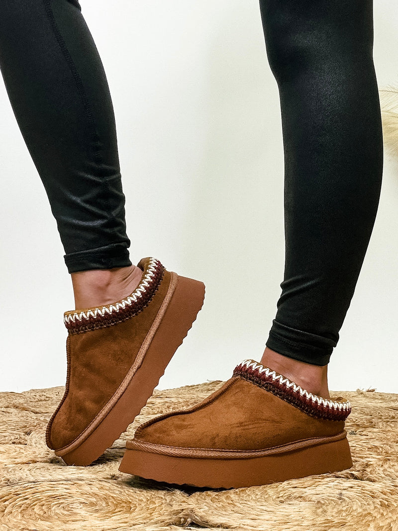 Cognac slip-on shoes with sherpa-like lining by MIA Yndigo, featuring a true-to-size fit for cozy comfort in fall.