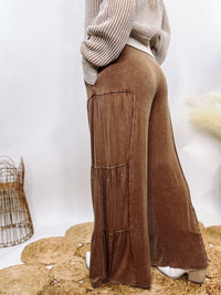 Brown Acid Washed Tiered Flared Wide Leg Boho Pants with Elastic Drawstring Waist, Side Pockets, and Comfortable 100% Cotton Fabric.