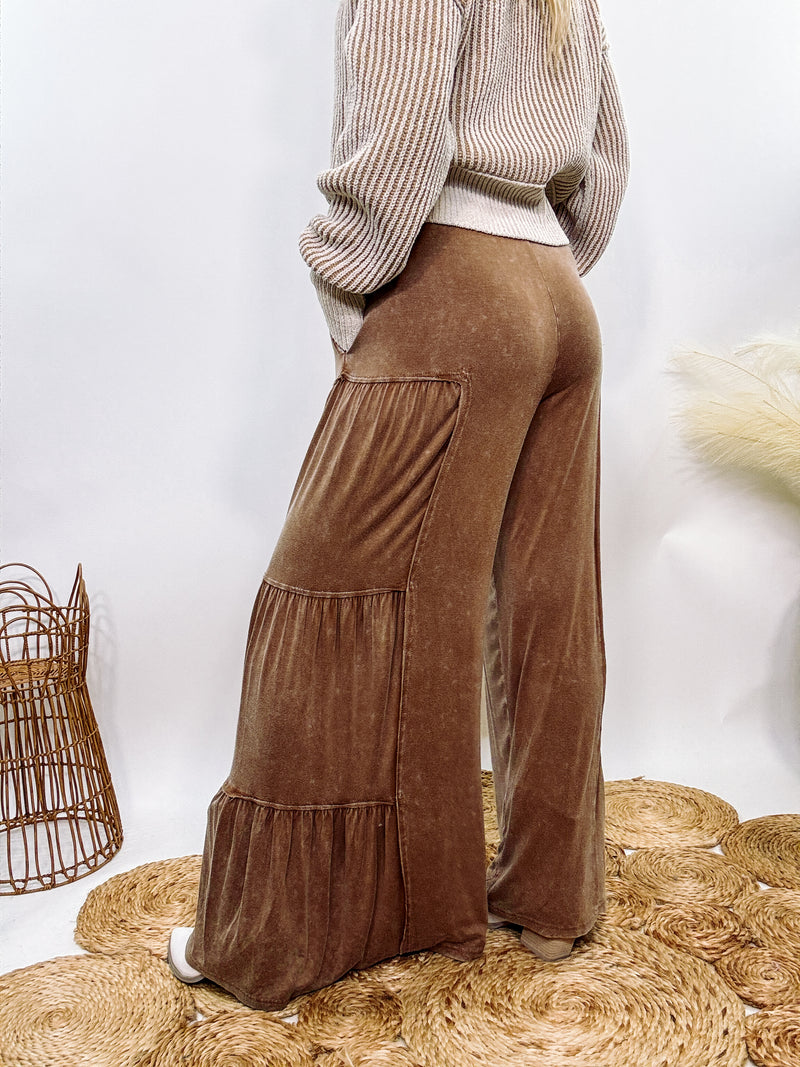 Brown Acid Washed Tiered Flared Wide Leg Boho Pants with Elastic Drawstring Waist, Side Pockets, and Comfortable 100% Cotton Fabric.