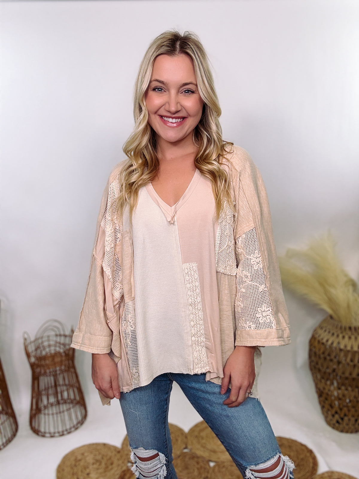 POL Neutral Cream Mix Short Sleeve V-Neck Oversized Knit Top with crochet and thermal patchwork, frayed edges, and exposed seams for a comfy, boho chic look.