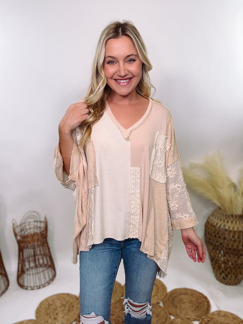 POL Neutral Cream Mix Short Sleeve V-Neck Oversized Knit Top with crochet and thermal patchwork, frayed edges, and exposed seams for a comfy, boho chic look.