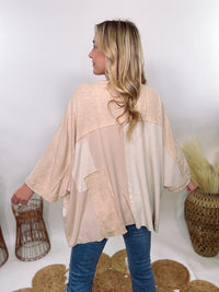 POL Neutral Cream Mix Short Sleeve V-Neck Oversized Knit Top with crochet and thermal patchwork, frayed edges, and exposed seams for a comfy, boho chic look.