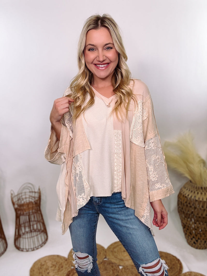 POL Neutral Cream Mix Short Sleeve V-Neck Oversized Knit Top with crochet and thermal patchwork, frayed edges, and exposed seams for a comfy, boho chic look.