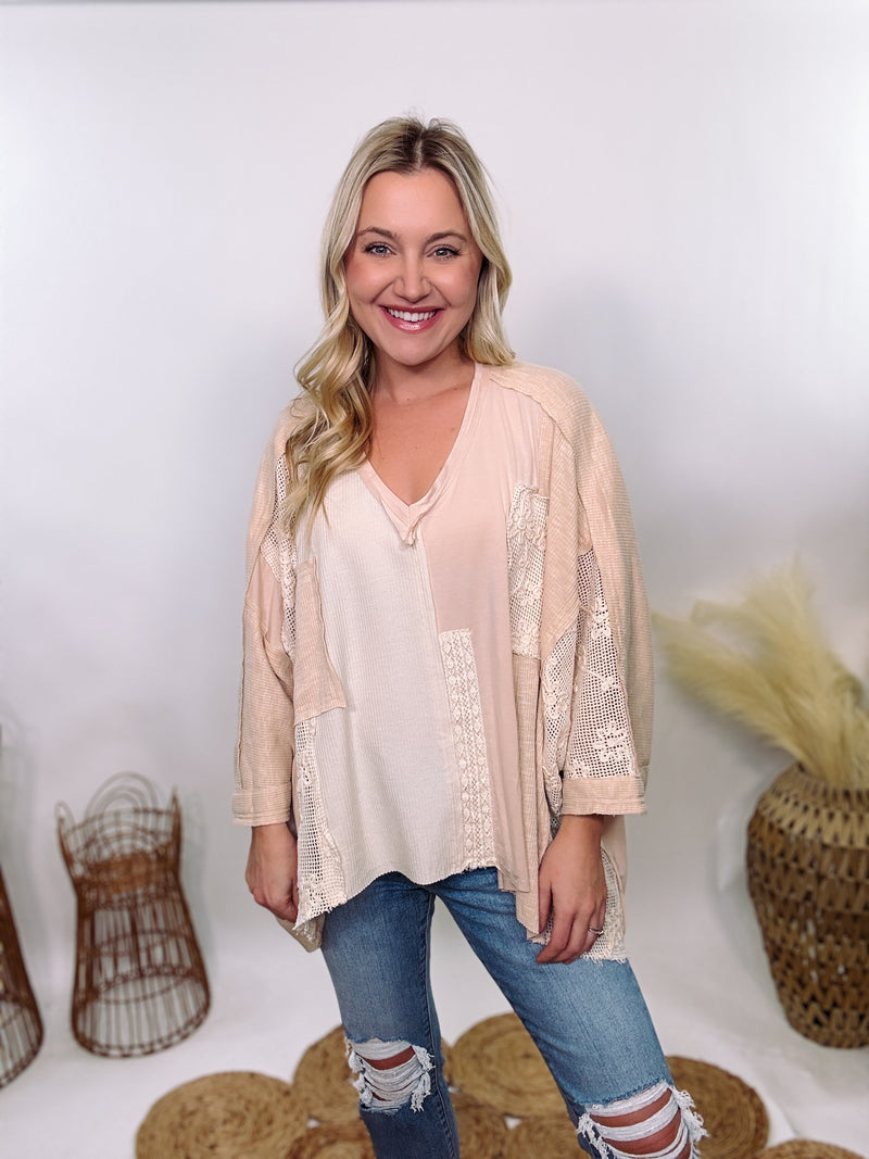 POL Neutral Cream Mix Short Sleeve V-Neck Oversized Knit Top with crochet and thermal patchwork, frayed edges, and exposed seams for a comfy, boho chic look.