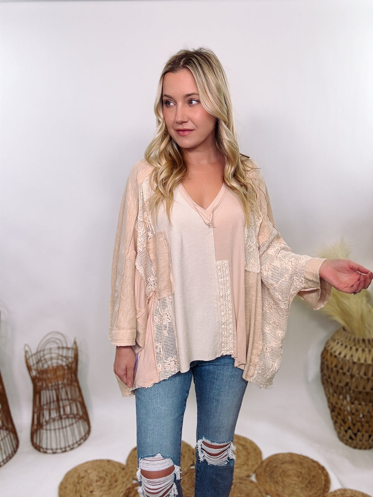 POL Neutral Cream Mix Short Sleeve V-Neck Oversized Knit Top with crochet and thermal patchwork, frayed edges, and exposed seams for a comfy, boho chic look.