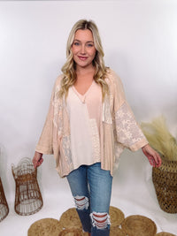 POL Neutral Cream Mix Short Sleeve V-Neck Oversized Knit Top with crochet and thermal patchwork, frayed edges, and exposed seams for a comfy, boho chic look.