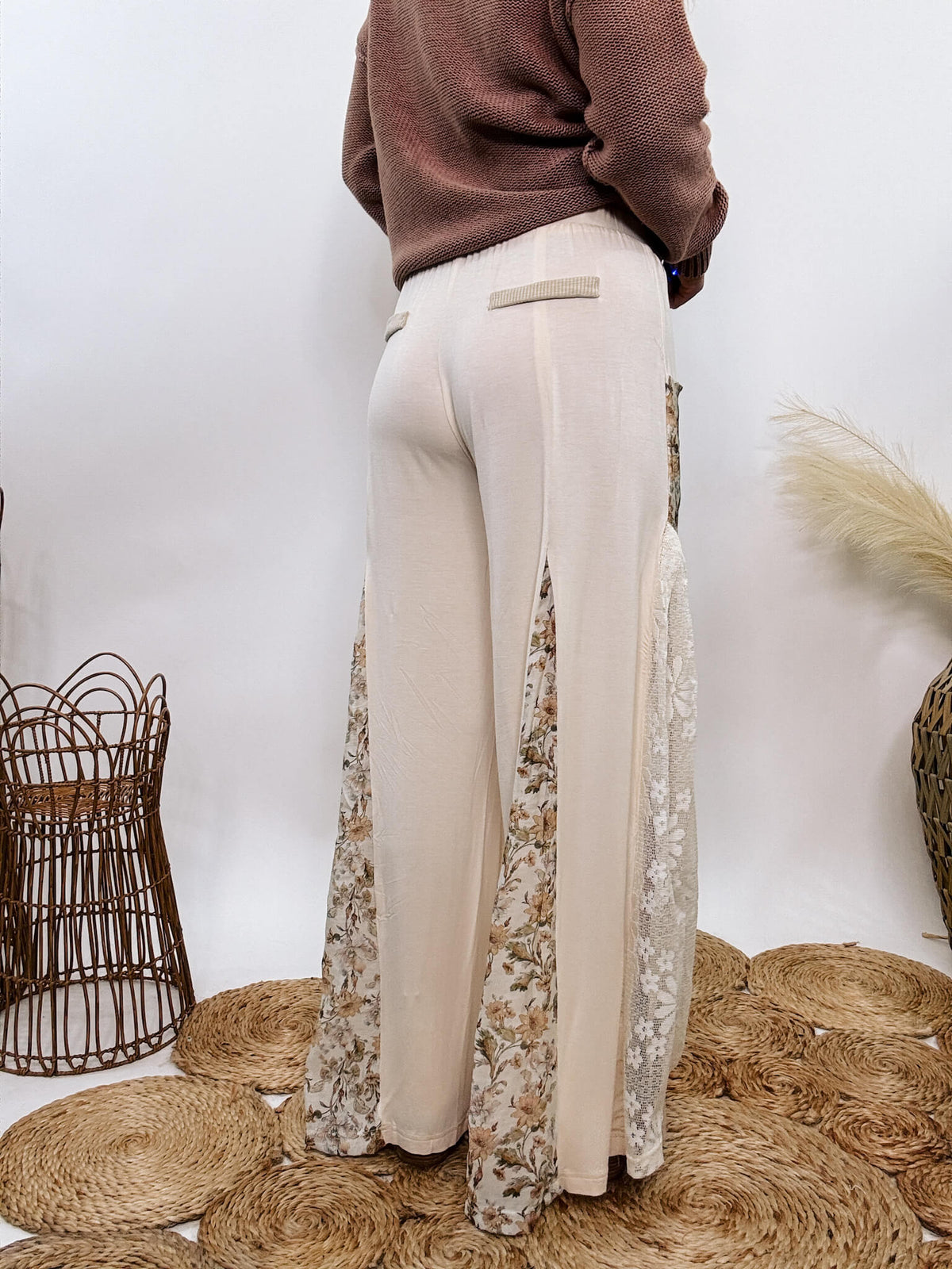 POL Lace and Floral Wide Leg Boho Pants in cream with floral accents and lace details.