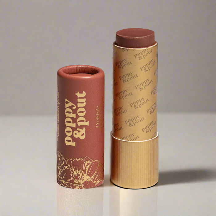 Poppy & Pout Debbie Lip Tint - Dark Peach Shade in Eco-Friendly Packaging with Buildable Sheer Color.