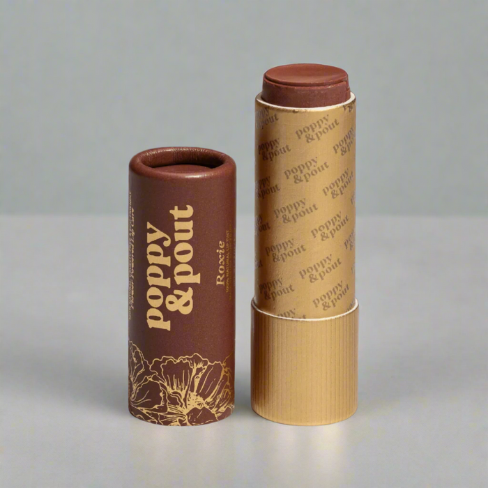 Poppy & Pout Lip Tint in the shade Roxie - a brick-colored, eco-friendly lip balm with natural ingredients.