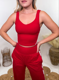 Red & White Sporty Padded V-Neck Tank Top with white piping contrast detail. Athleisure fit with removable bra padding, perfect for yoga, workouts, and casual wear. matching yoga athleisure set.