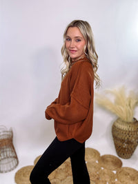 Rust Oversized Long Sleeve Sweater with Soft Stretchy Ribbed Knit, Crew Neckline, Drop Shoulders, and Ribbed Accents – Cozy and Stylish Fall and Winter Layering Piece.