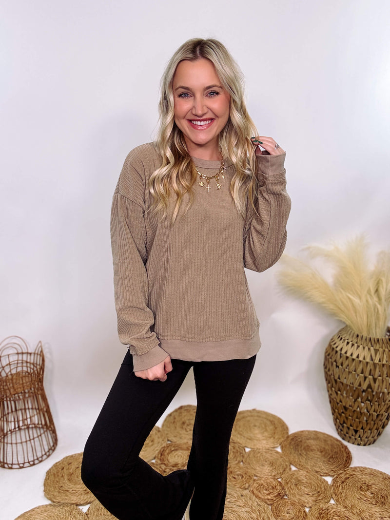 Washed Brown Oversized Ribbed Long Sleeve Top with Soft Texture and Exposed Stitch Details – Cozy and Stylish Layering Piece for Fall and Winter. Perfect for Casual Outfits, Lounging, or Pairing with Jackets.