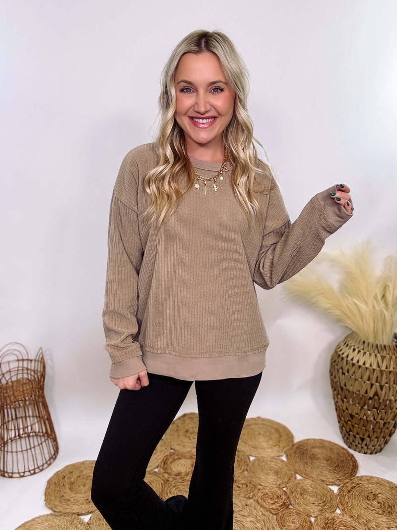 Washed Brown Oversized Ribbed Long Sleeve Top with Soft Texture and Exposed Stitch Details – Cozy and Stylish Layering Piece for Fall and Winter. Perfect for Casual Outfits, Lounging, or Pairing with Jackets.