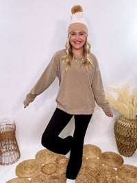 Washed Brown Oversized Ribbed Long Sleeve Top with Soft Texture and Exposed Stitch Details – Cozy and Stylish Layering Piece for Fall and Winter. Perfect for Casual Outfits, Lounging, or Pairing with Jackets.